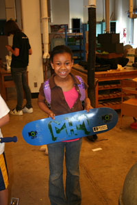 girl buying a skateboard